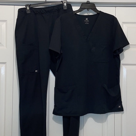 Kalea black scrub set size large. These are in good used condition. - Picture 1 of 2